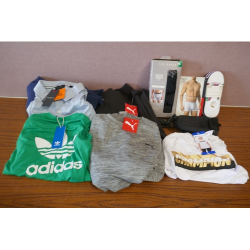 6193 - A quantity of mixed branded clothing to include, Puma, Adidas, Ted Baker, DKNY, etc. Various sizes a... 