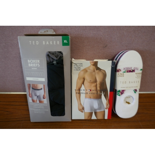 6193 - A quantity of mixed branded clothing to include, Puma, Adidas, Ted Baker, DKNY, etc. Various sizes a... 