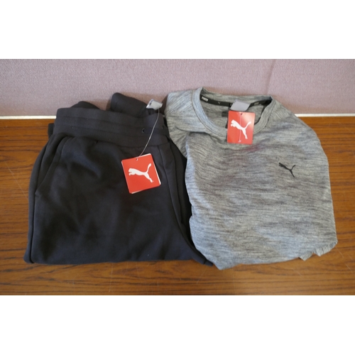 6193 - A quantity of mixed branded clothing to include, Puma, Adidas, Ted Baker, DKNY, etc. Various sizes a... 