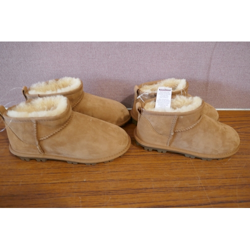 6202 - Two pairs of children's Kirkland Signature boots, size UK 1 and 2 and a pair of children's 32 Degree... 