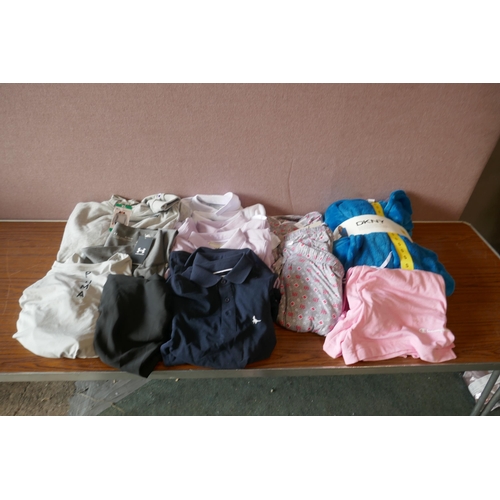 6238 - A quantity of branded mixed clothing to include, Jack Wills, DKNY, Under Armour, etc. Various styles... 