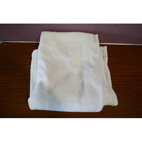 6253 - Charisma towels and a large soft throw *This lot is subject to VAT