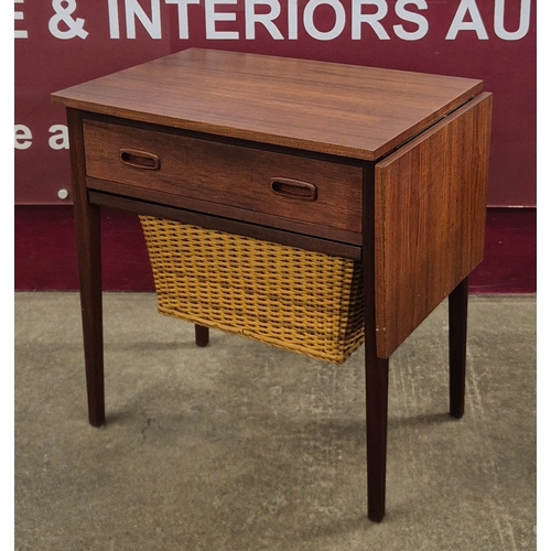 1 - A Danish teak and rattan drop-leaf sewing table