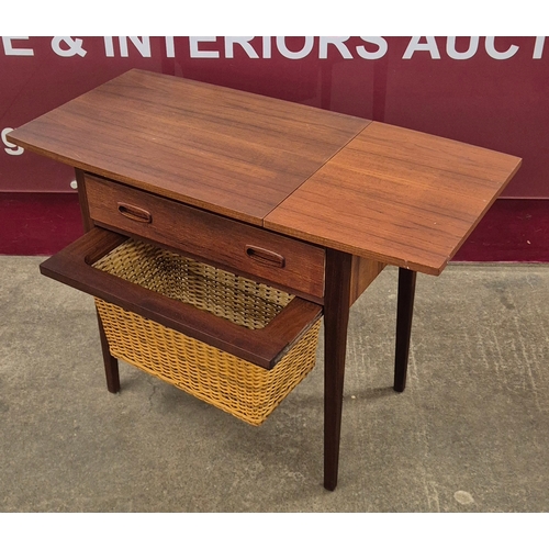 1 - A Danish teak and rattan drop-leaf sewing table