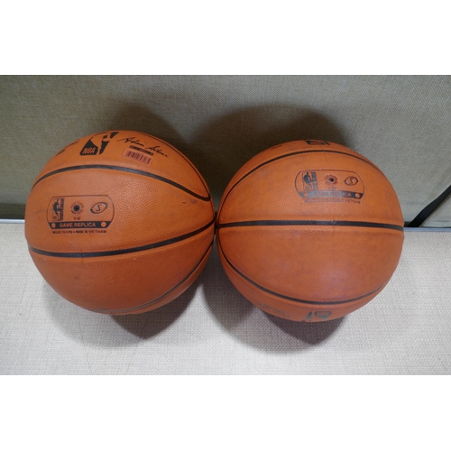 6255 - Two Spalding NBA basketball (359A-41,211) *This lot is subject to VAT