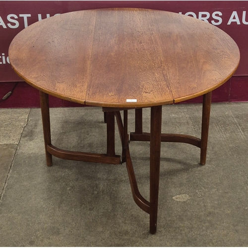 6 - A teak drop-leaf table