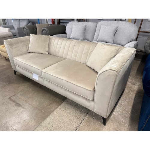 3157 - A champagne velvet upholstered shell back 3 seater sofa (transit mark)