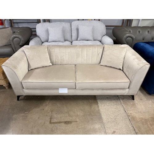 3157 - A champagne velvet upholstered shell back 3 seater sofa (transit mark)