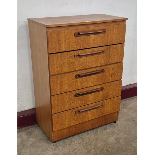 19 - A teak chest of drawers
