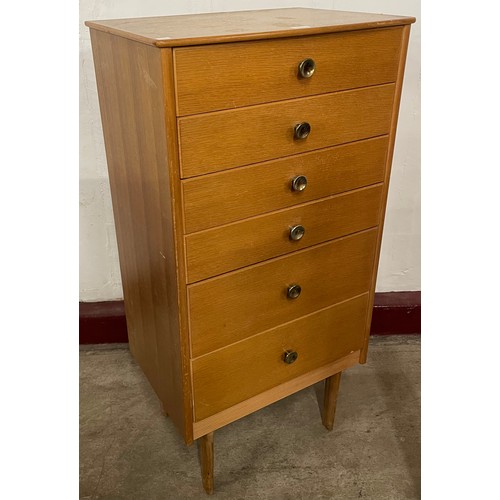 41 - A light oak chest of drawers