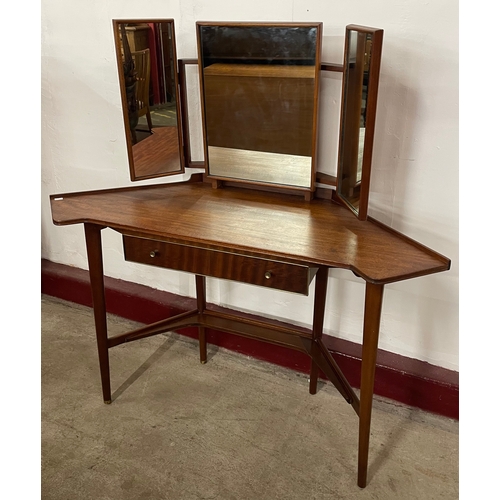 48 - A Greaves & Thomas afromosia corner dressing table