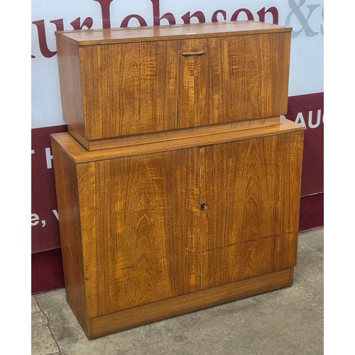 46 - An Avalon teak cocktail cabinet
