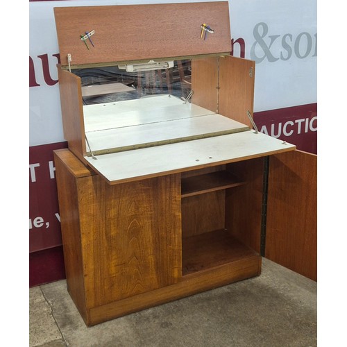 46 - An Avalon teak cocktail cabinet