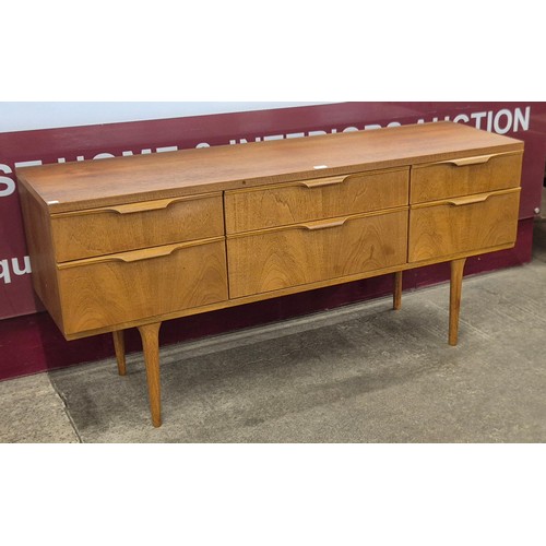 49 - An Austin Suite teak six drawer sideboard