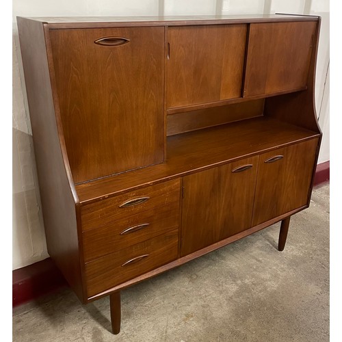 35 - A Jentique teak highboard
