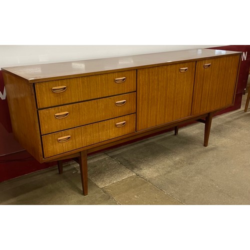 40 - A teak sideboard