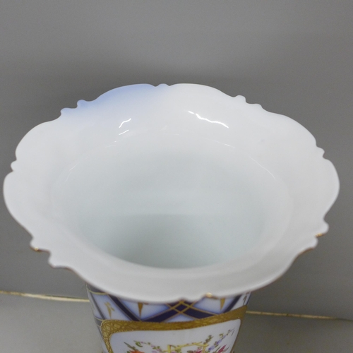 2006 - A Staffordshire Roselle Occ & Co. porcelain vase, blue and gilt with flower detail, 29cm