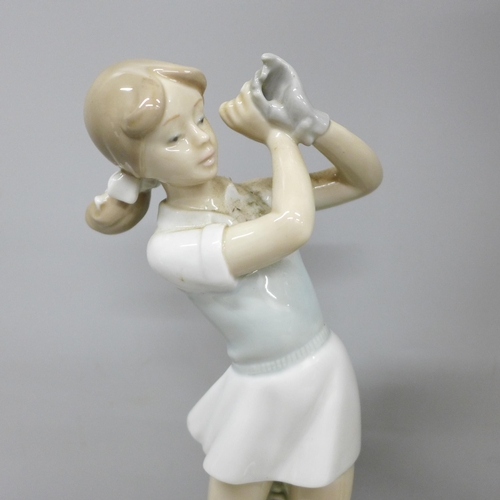 2007 - A large Lladro figure and Nao figure, lady golfers, tallest 36cm, (lacking clubs)  **PLEASE NOTE THI... 