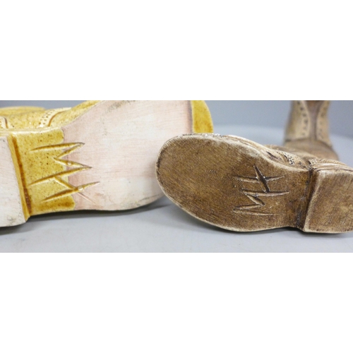 2010 - A collection of novelty ceramic boots and a small cast cobblers last