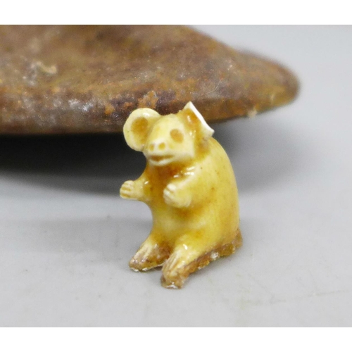 2010 - A collection of novelty ceramic boots and a small cast cobblers last