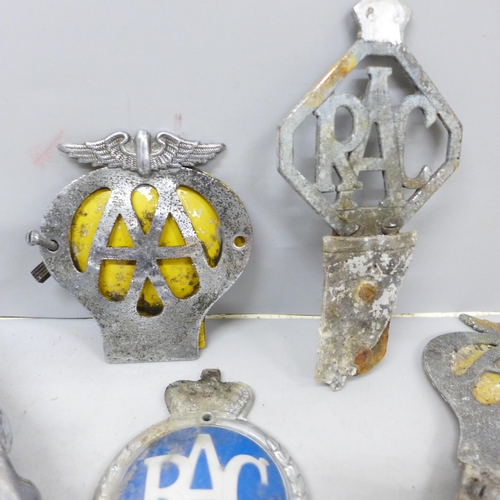 2014 - A Jaguar car mascot, two AA and RAC badges and a toy gun