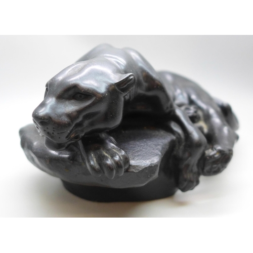 2019 - A black composite stone model of a panther, after Masson, 21cm