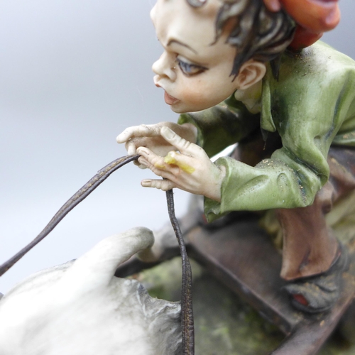 2021 - An Italian Capodimonte porcelain figure, 'The Reluctant Donkey', modelled by G. Cortese