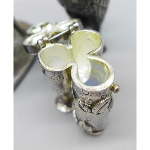 2022 - A novelty pill box in the form of a wine bottle, chromed metal Tom and Jerry figures and three other... 