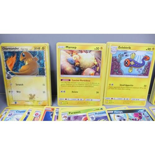 2030 - A collection of Pokemon cards with vintage and rares, approximately 560, in collectors tin