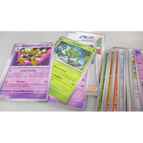 2030 - A collection of Pokemon cards with vintage and rares, approximately 560, in collectors tin
