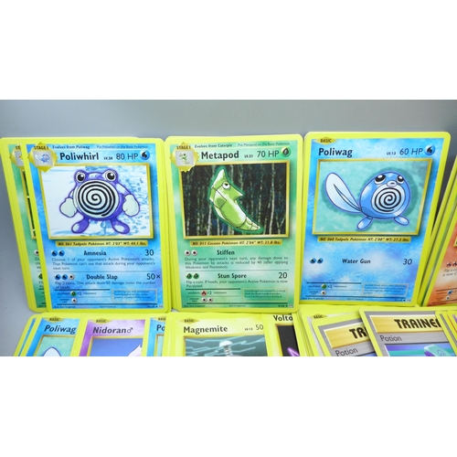 2034 - A collection of Pokemon cards, XY Evolution, approximately 180, with collectors tin