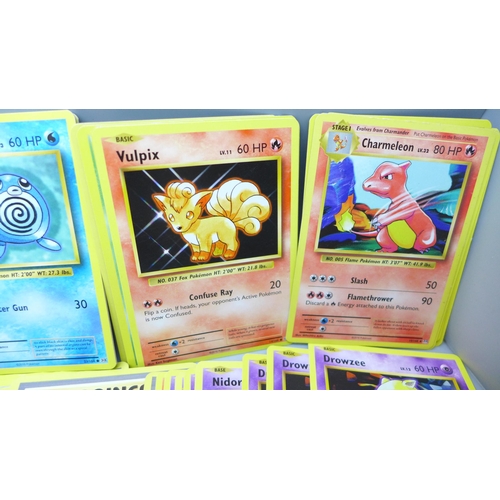 2034 - A collection of Pokemon cards, XY Evolution, approximately 180, with collectors tin