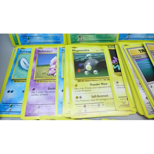 2034 - A collection of Pokemon cards, XY Evolution, approximately 180, with collectors tin