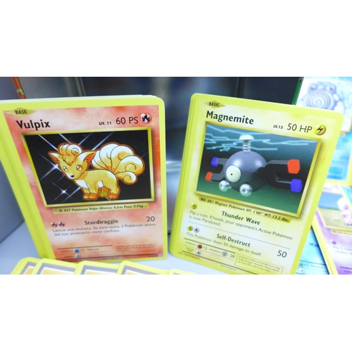 2034 - A collection of Pokemon cards, XY Evolution, approximately 180, with collectors tin