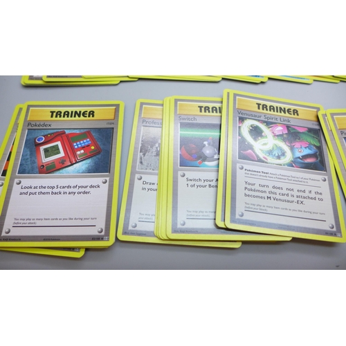 2034 - A collection of Pokemon cards, XY Evolution, approximately 180, with collectors tin