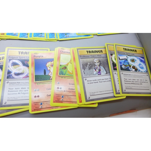 2034 - A collection of Pokemon cards, XY Evolution, approximately 180, with collectors tin
