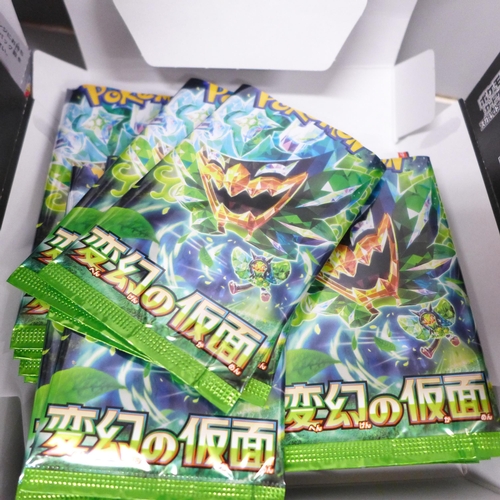 2059 - A collection of Japanese Pokémon cards, open packs with cards