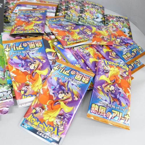 2059 - A collection of Japanese Pokémon cards, open packs with cards