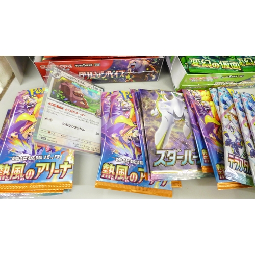 2059 - A collection of Japanese Pokémon cards, open packs with cards
