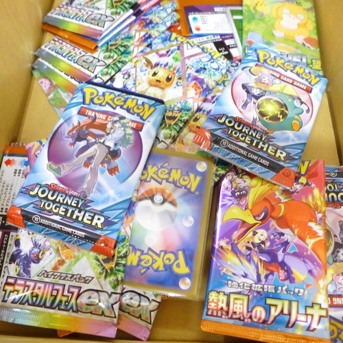 2059 - A collection of Japanese Pokémon cards, open packs with cards