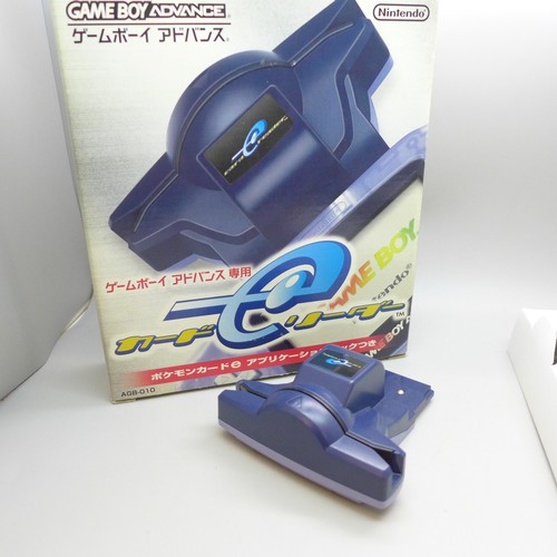 2052 - A Game Boy Advance card reader with readable Pokémon cards