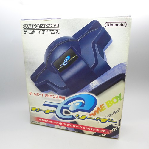 2052 - A Game Boy Advance card reader with readable Pokémon cards