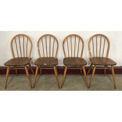 53 - A set of four Ercol Blonde elm and beech Windsor chairs