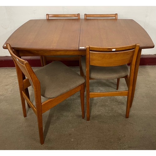 54 - A White & Newton teak rectangular extending dining table and four chairs