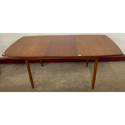 54 - A White & Newton teak rectangular extending dining table and four chairs