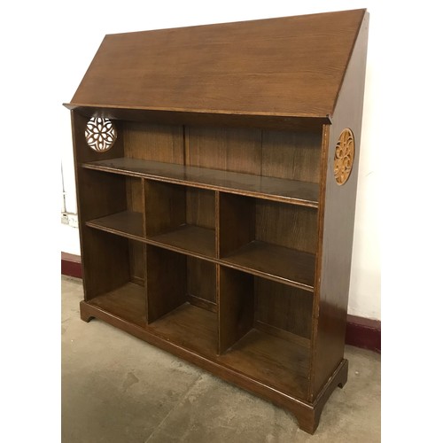260 - A Gothic style oak open bookcase