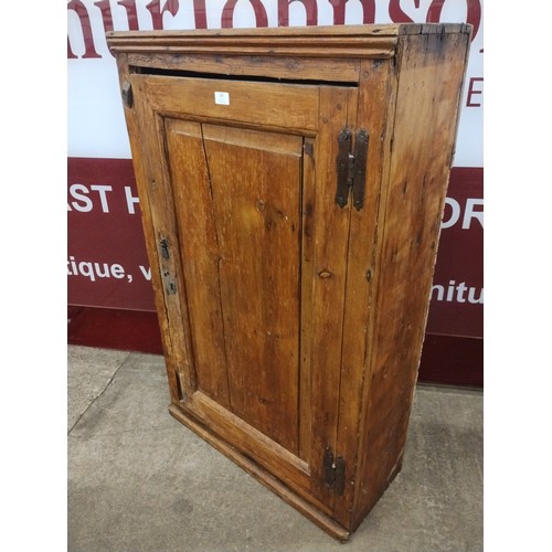 228 - A George III pine single door pantry cupboard