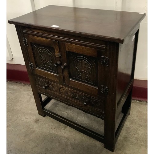 272 - A 17th Century style oak credence cupboard