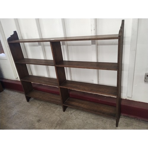 254 - An early 20th Century oak open bookcase