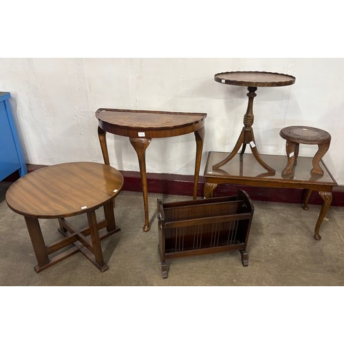 271F - A mahogany demi lune hall table, magazine rack, two coffee tables, a wine rack and a carved hardwood... 